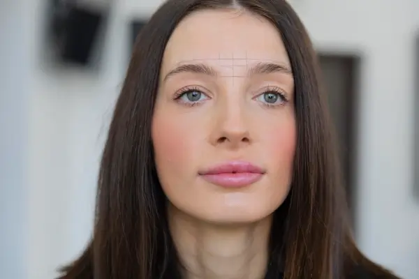 front view of a woman having wrinkles on forehead