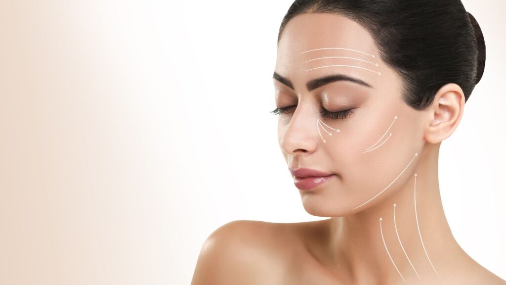 a women with arrow marks showing the effect of dermal filler in facial enhancements
