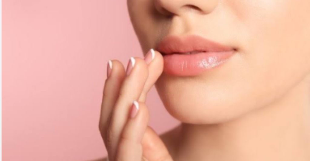 a women with enhanced, smooth lips after lip filler treatment at the laser cafe