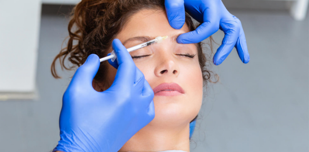 daxxify treatment being injected into women's forehead