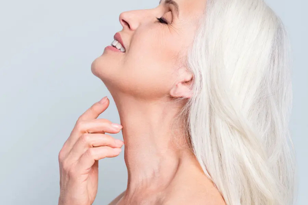 older women with visible horizontal neckline and lose skin